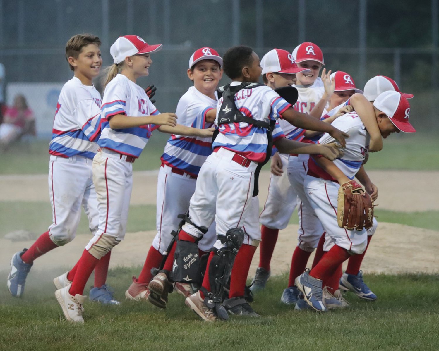 HEADED TO STATES: The WCA 10 year old team celebrates after winning the District I Championship last week against East Greenwich.